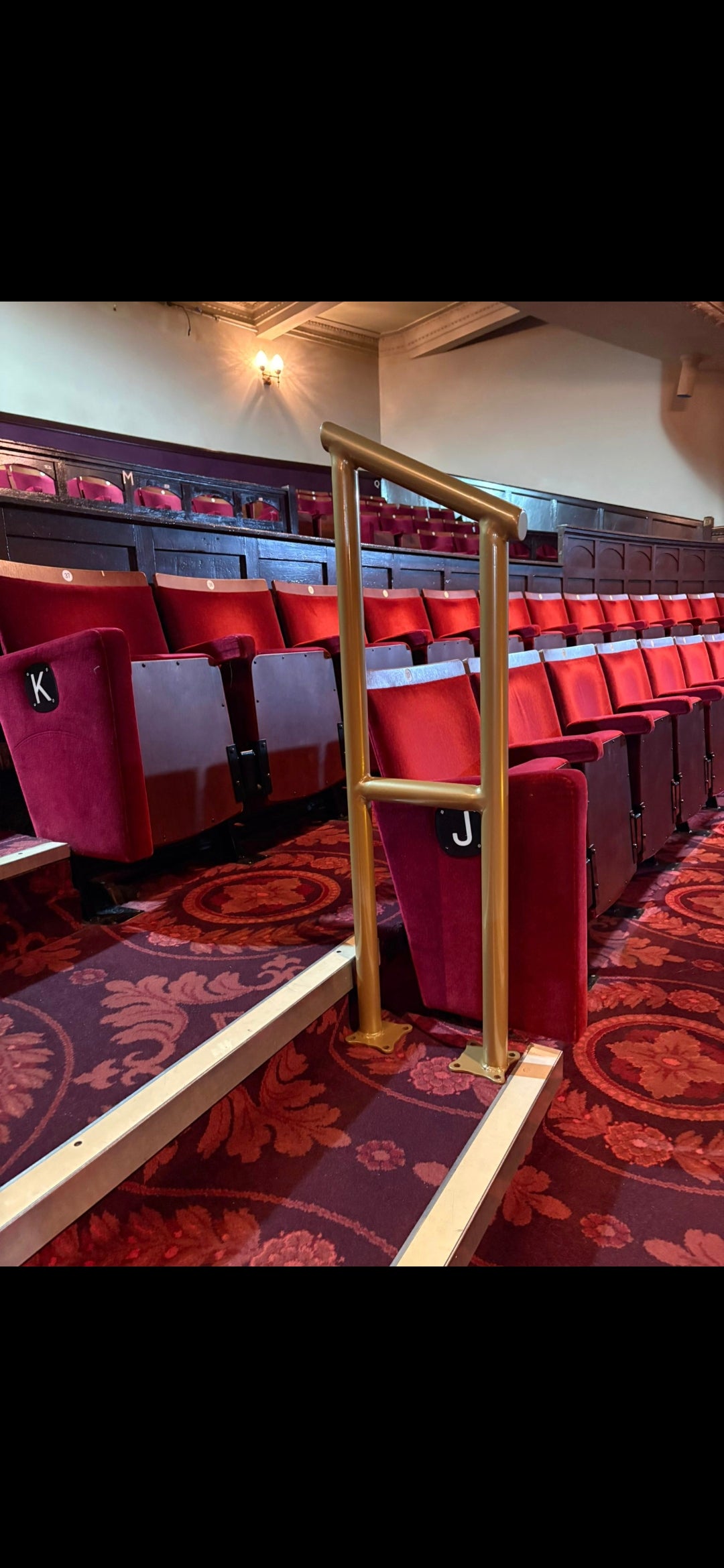 Bespoke brass effect handrail for performance venue