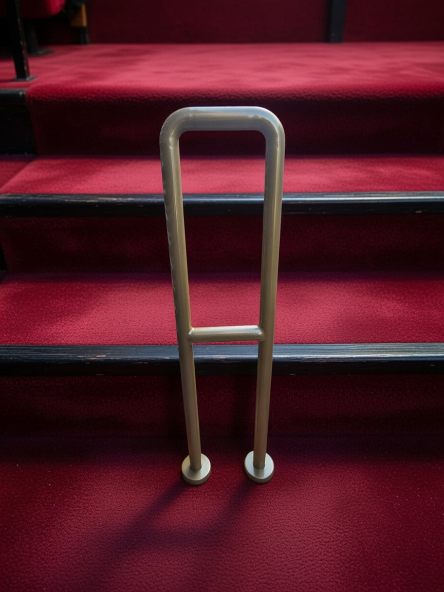 Theatre staircase handrail in brass effect finish